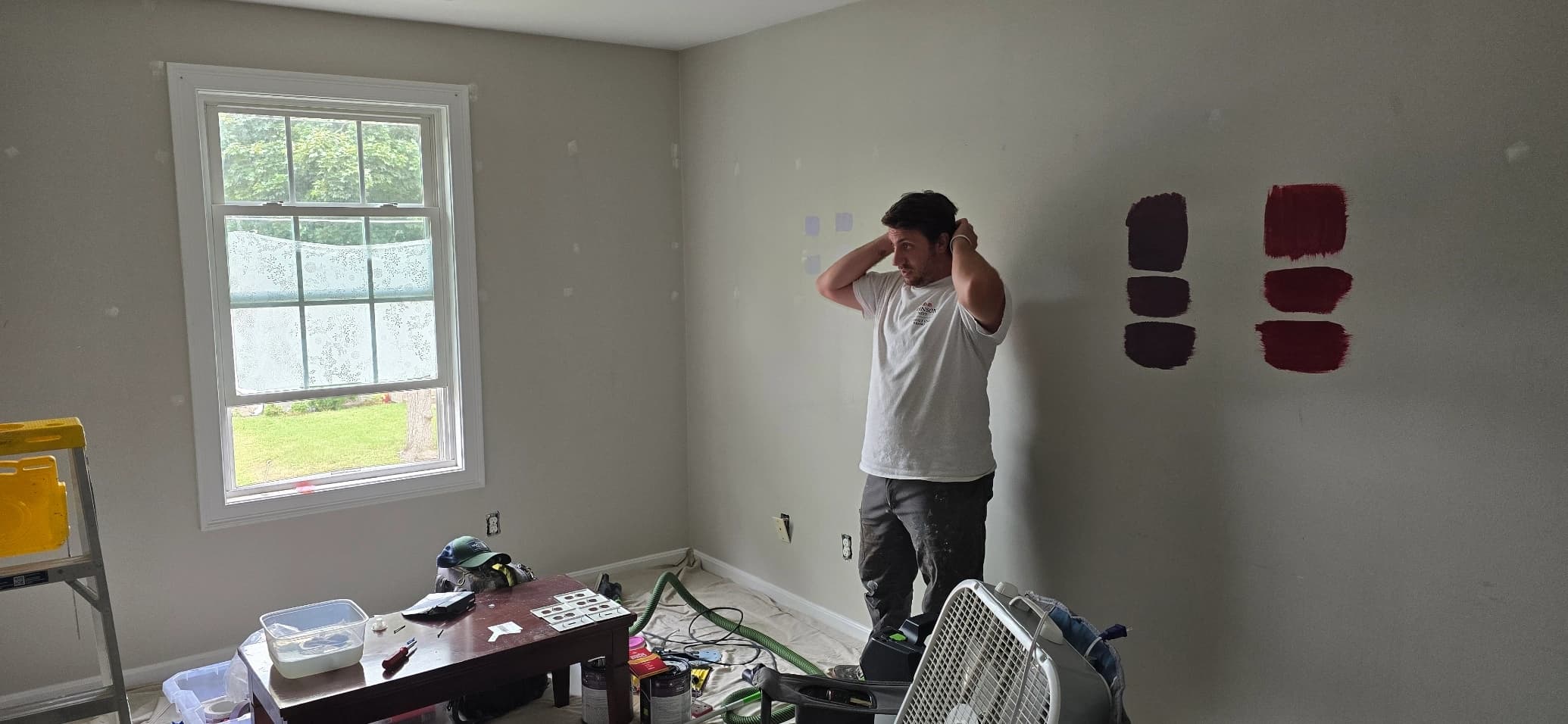 Professional wallpaper removal in progress